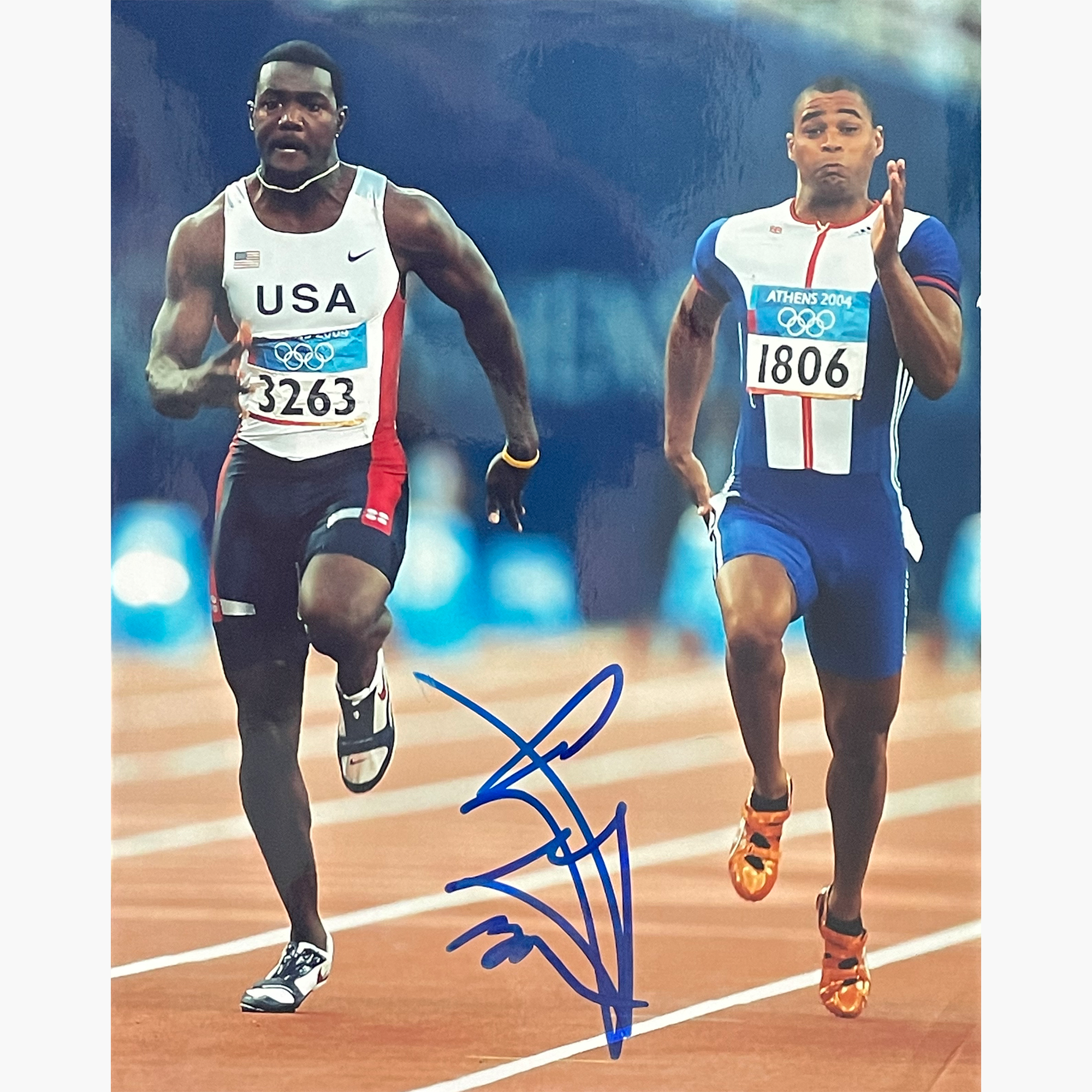 Justin Gatlin – Signed 19cm x 15.2cm Colour Action Photo