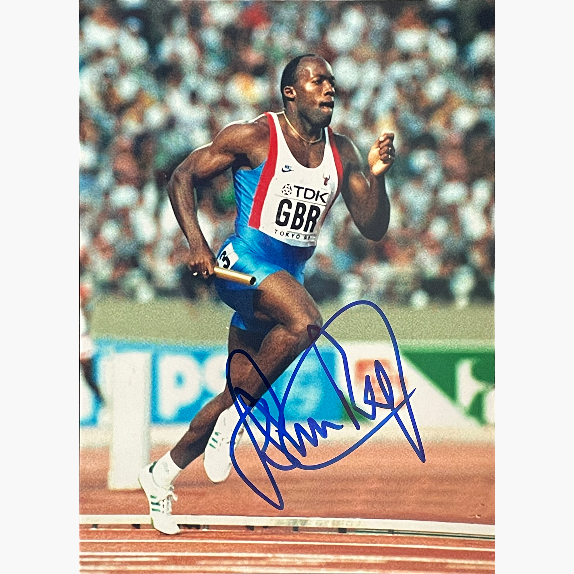 John Regis – Signed 21cm x 15cm Colour Action Photo