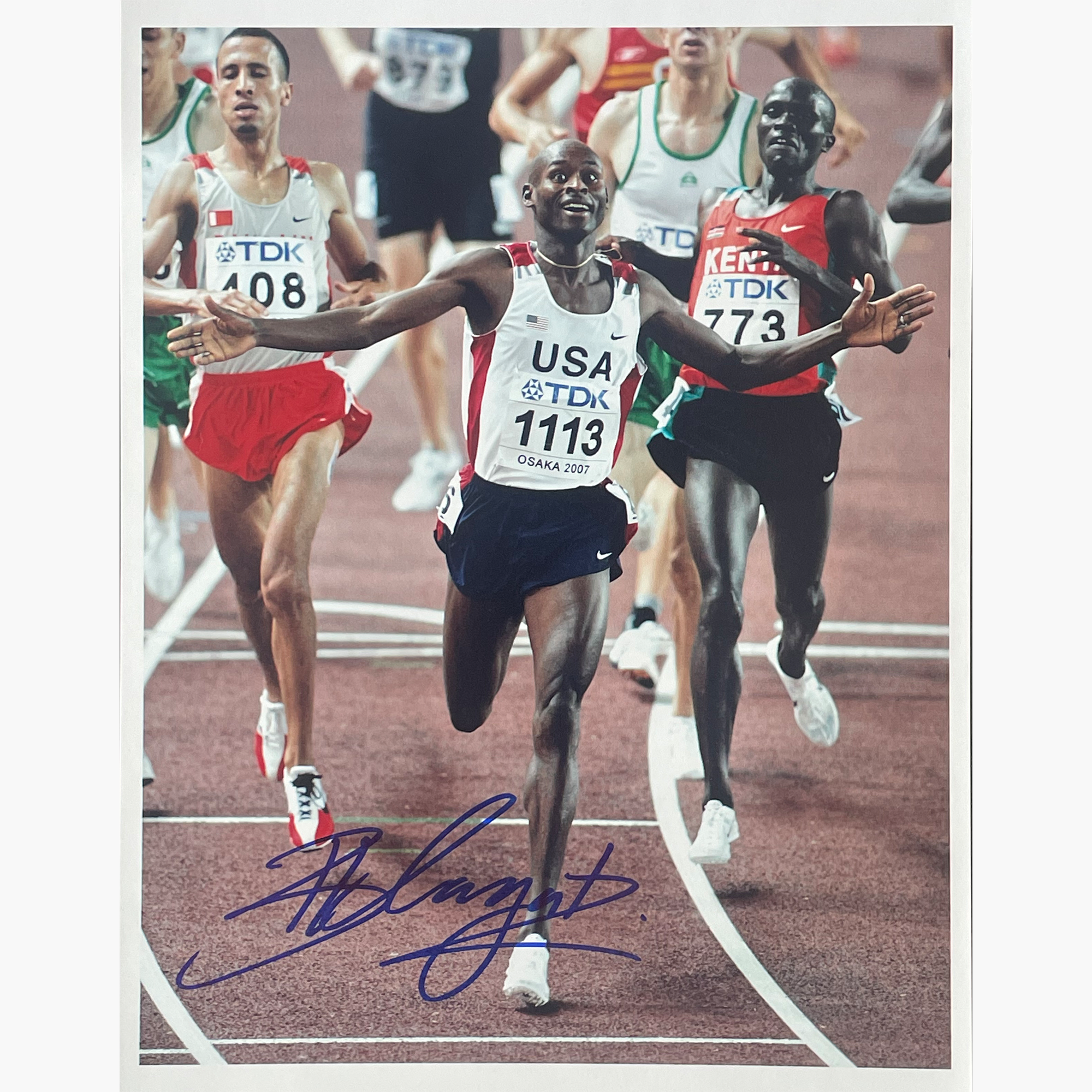 Bernard Lagat – Signed 25.5cm x 20.2cm Colour Action Photo