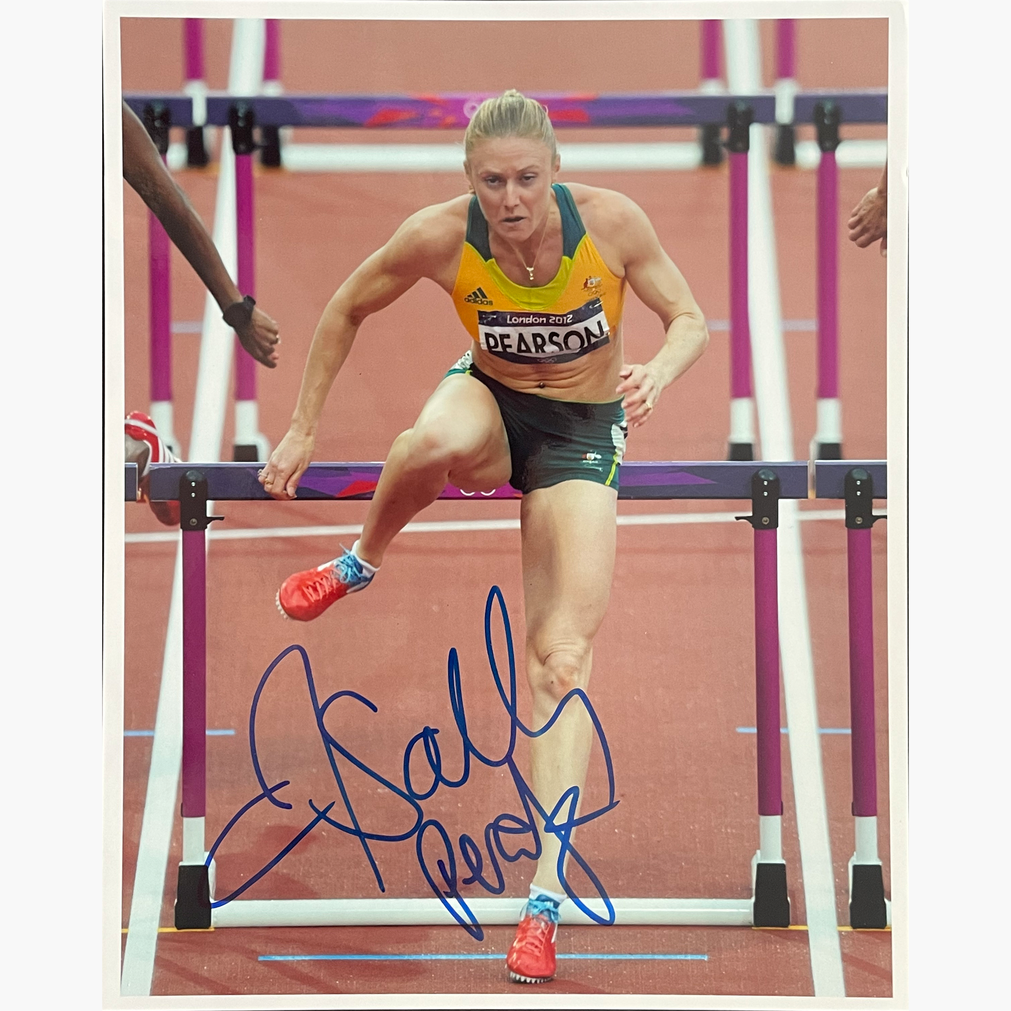 Sally Pearson – Signed 25.3cm x 20.2cm Colour Action Photo