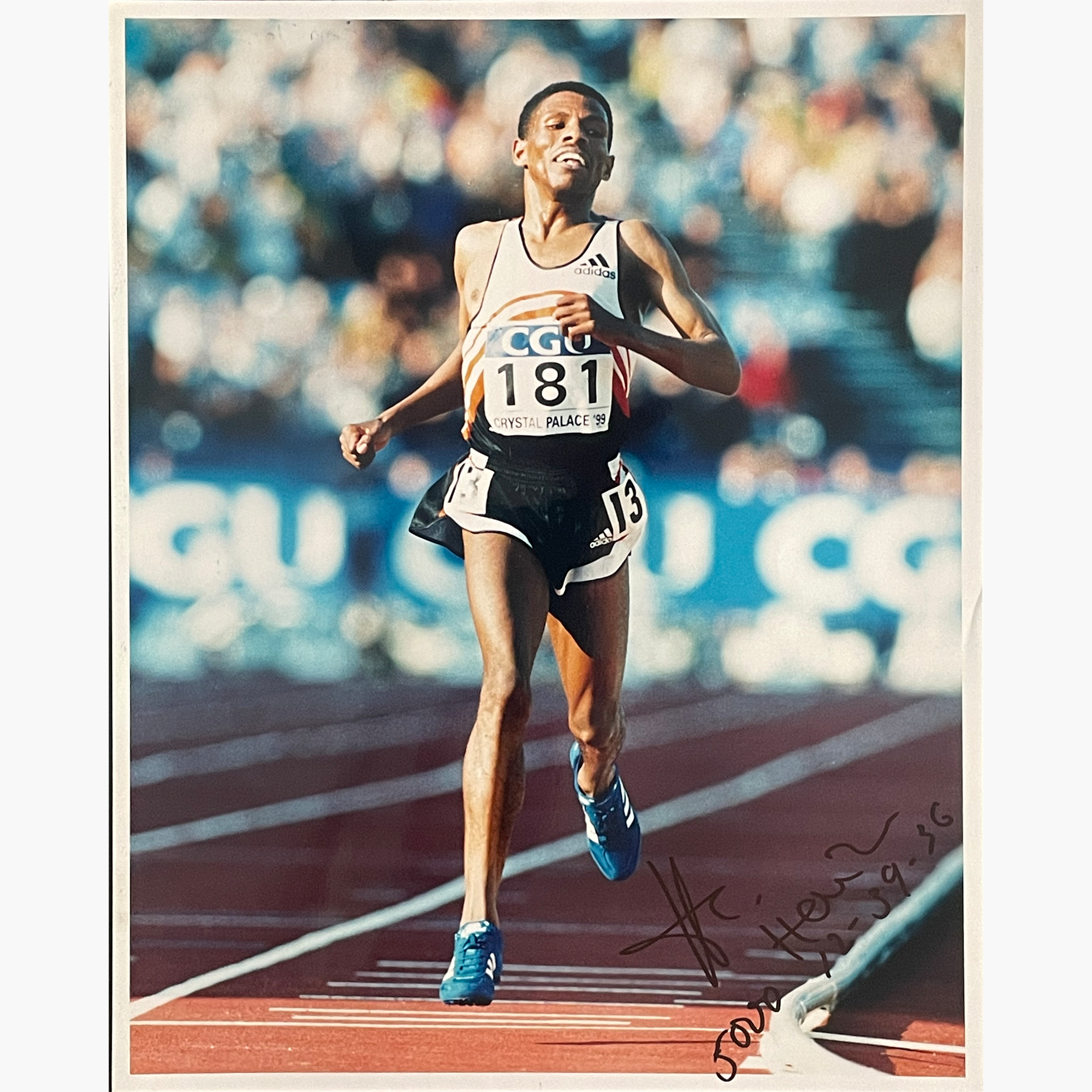 Haile Gebrselassie – Signed 25.5cm x 20.5cm Colour Action Press Photo