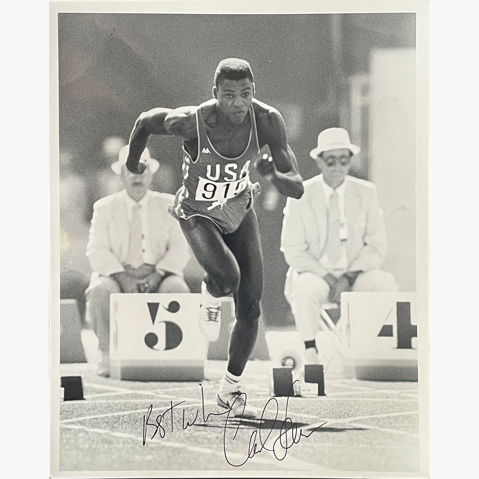 Carl Lewis – Signed 25.3cm x 20.2cm Black & White Action Press Photo