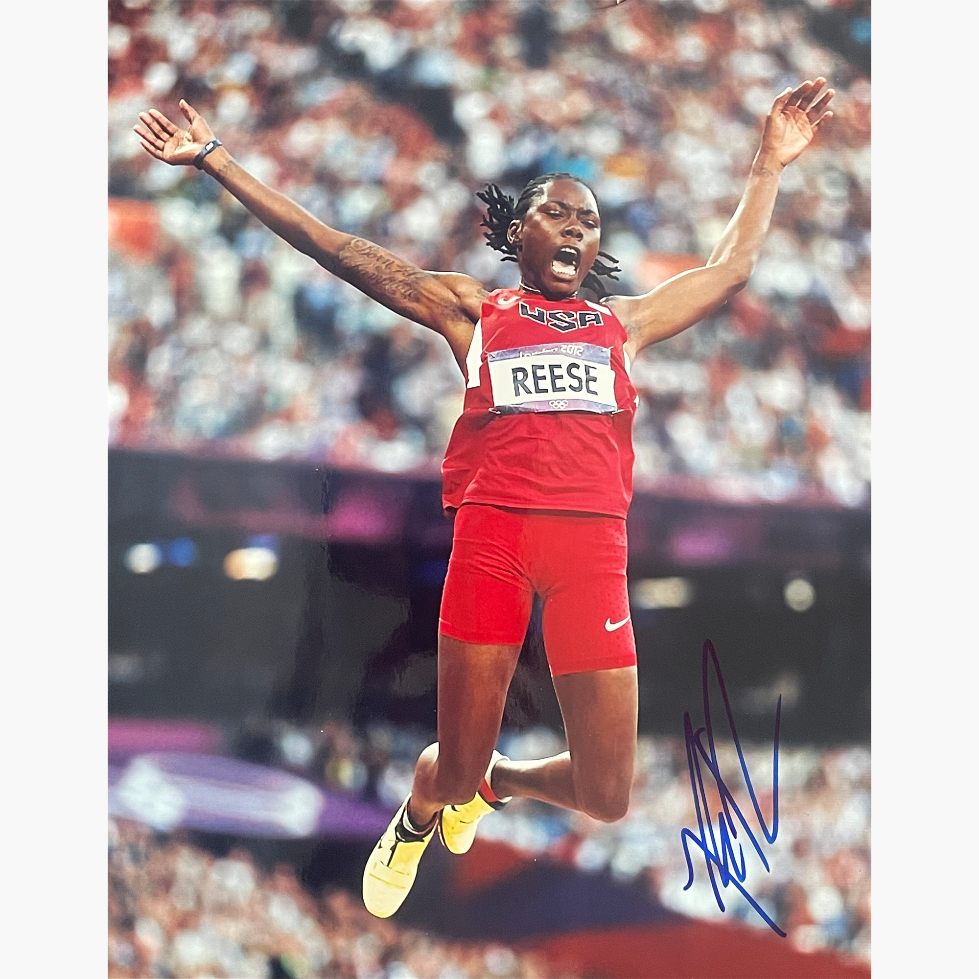 Brittney Reese – Signed 26cm x 20.5cm Colour Action Photo