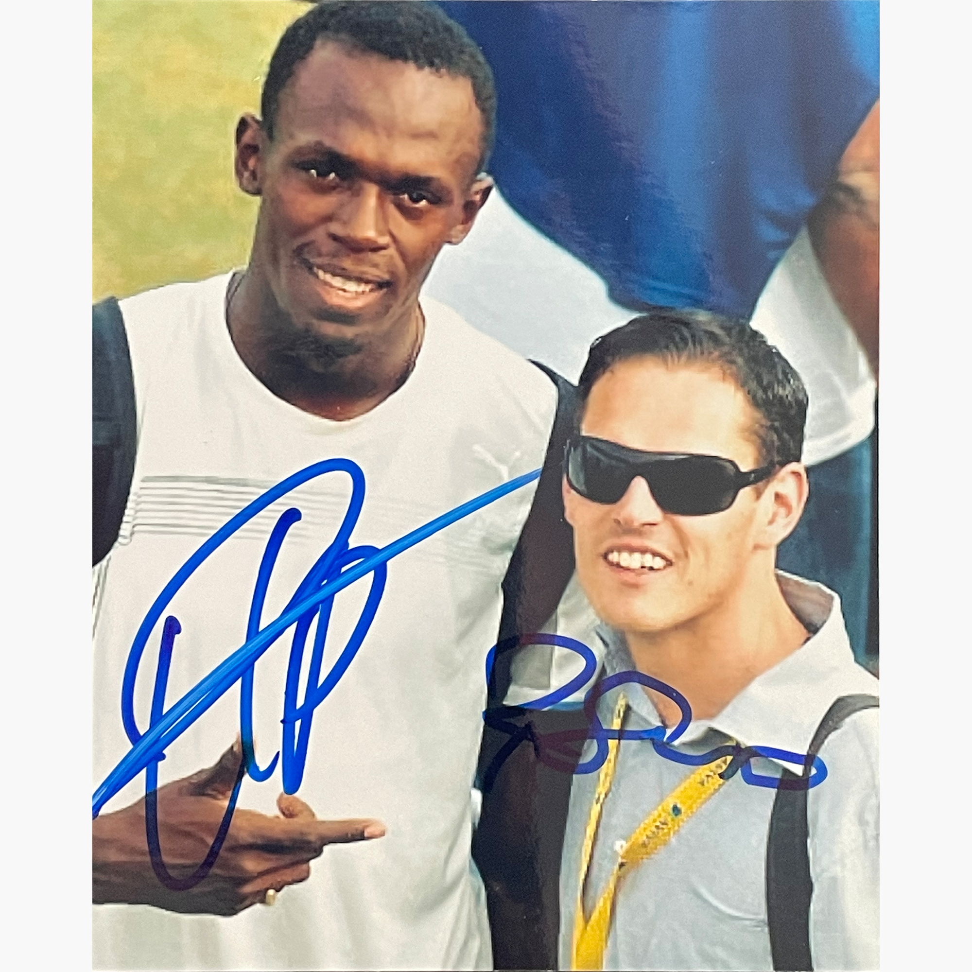 Usain Bolt & Ricky Simms – Signed 12.4cm x 10.2cm Colour Photo