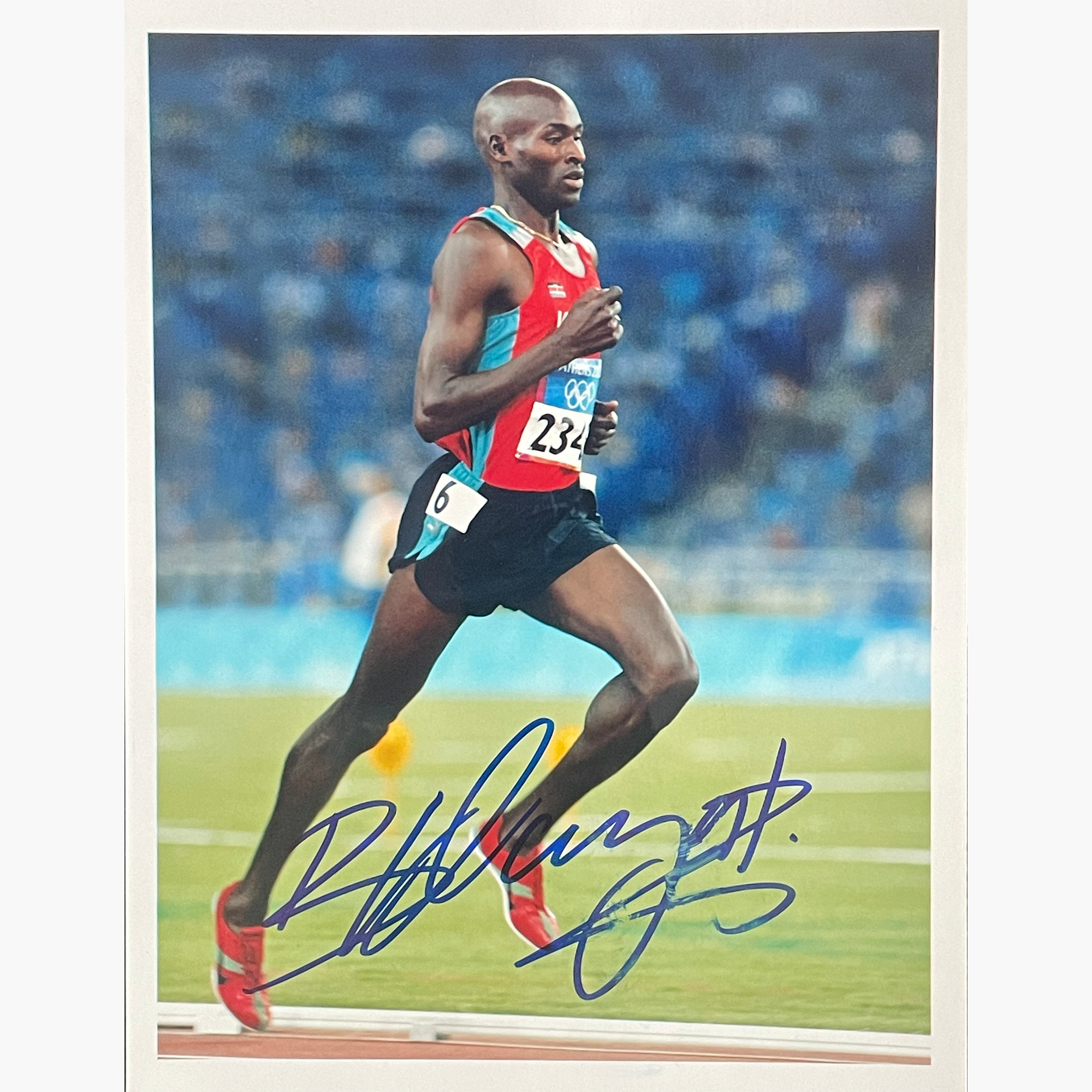 Bernard Lagat – Signed 19.5cm x 15cm Colour Action Photo