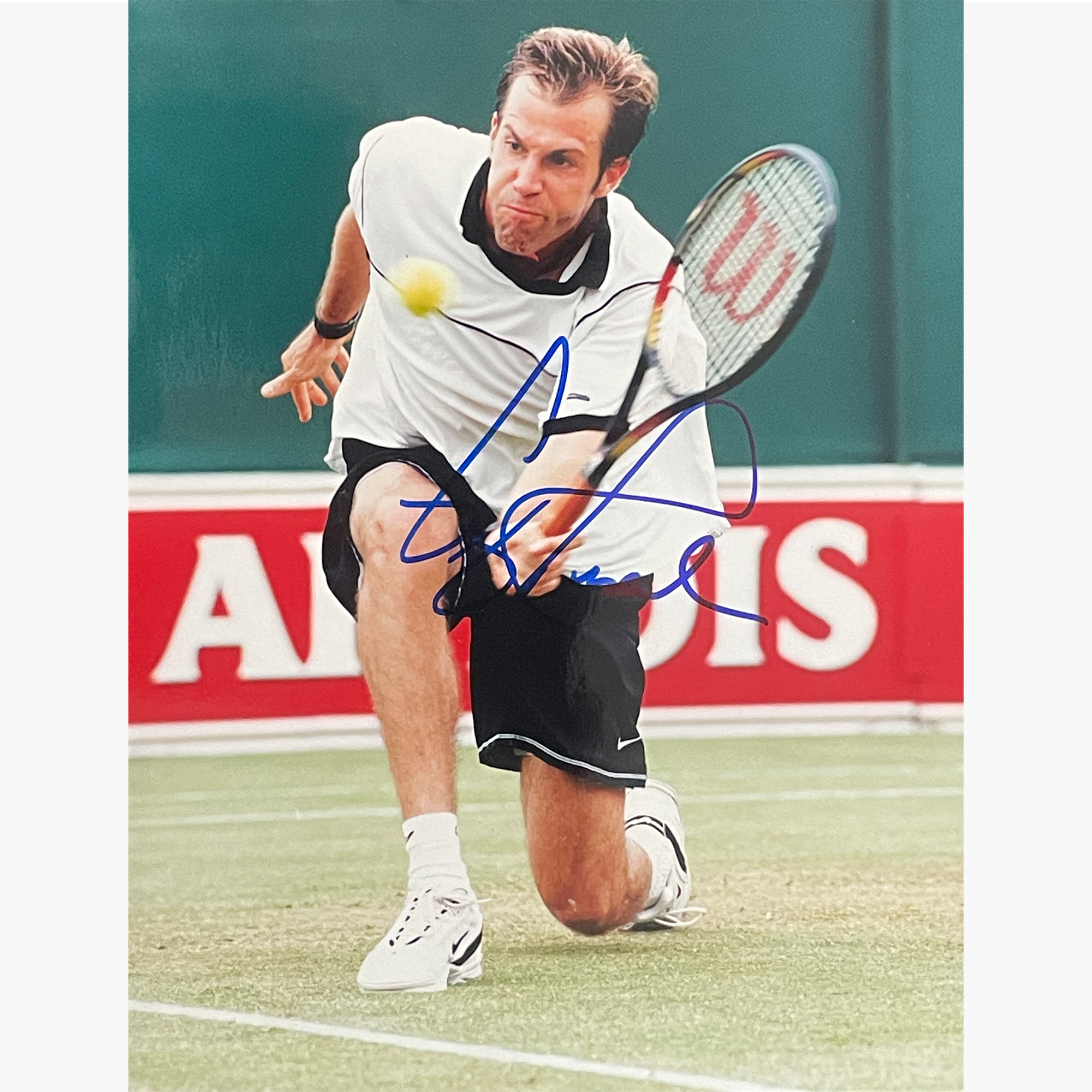 Greg Rusedski - Signed 25.5cm x 19.5cm Colour Action Press Photo