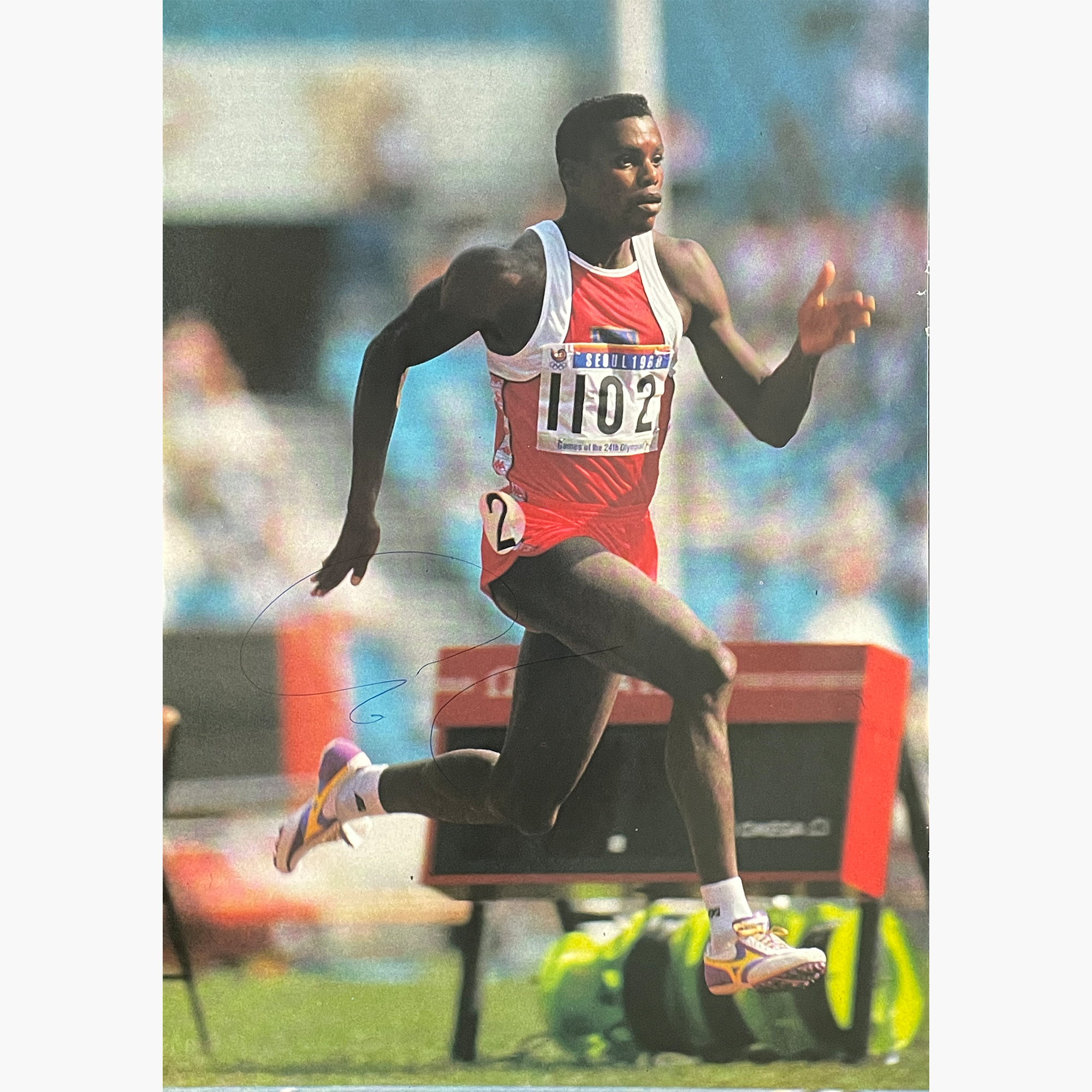 Carl Lewis – Signed 29.5cm x 20.5cm Colour Magazine Picture