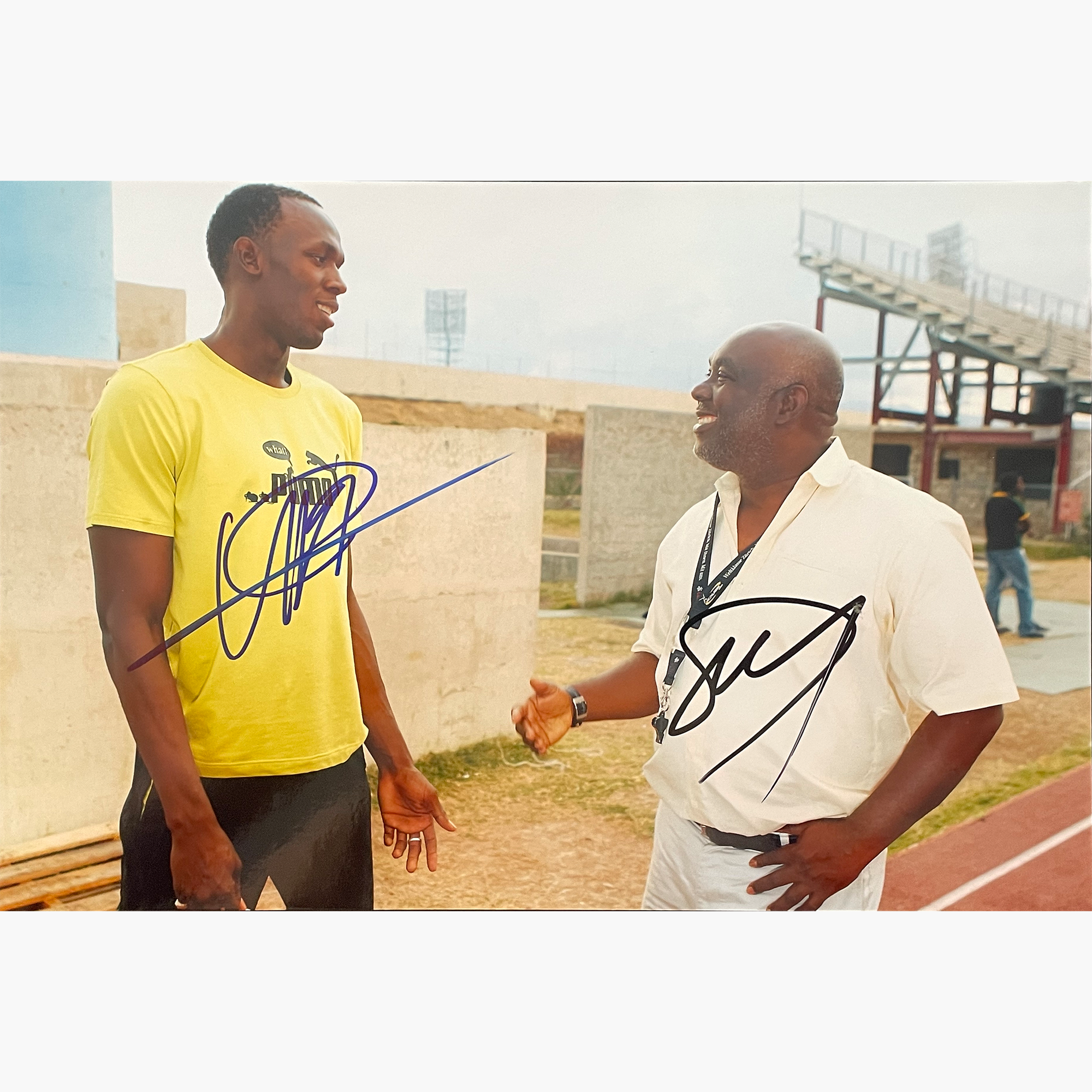Usain Bolt & Glenn Mills – Signed 30cm x 20cm Colour Photo