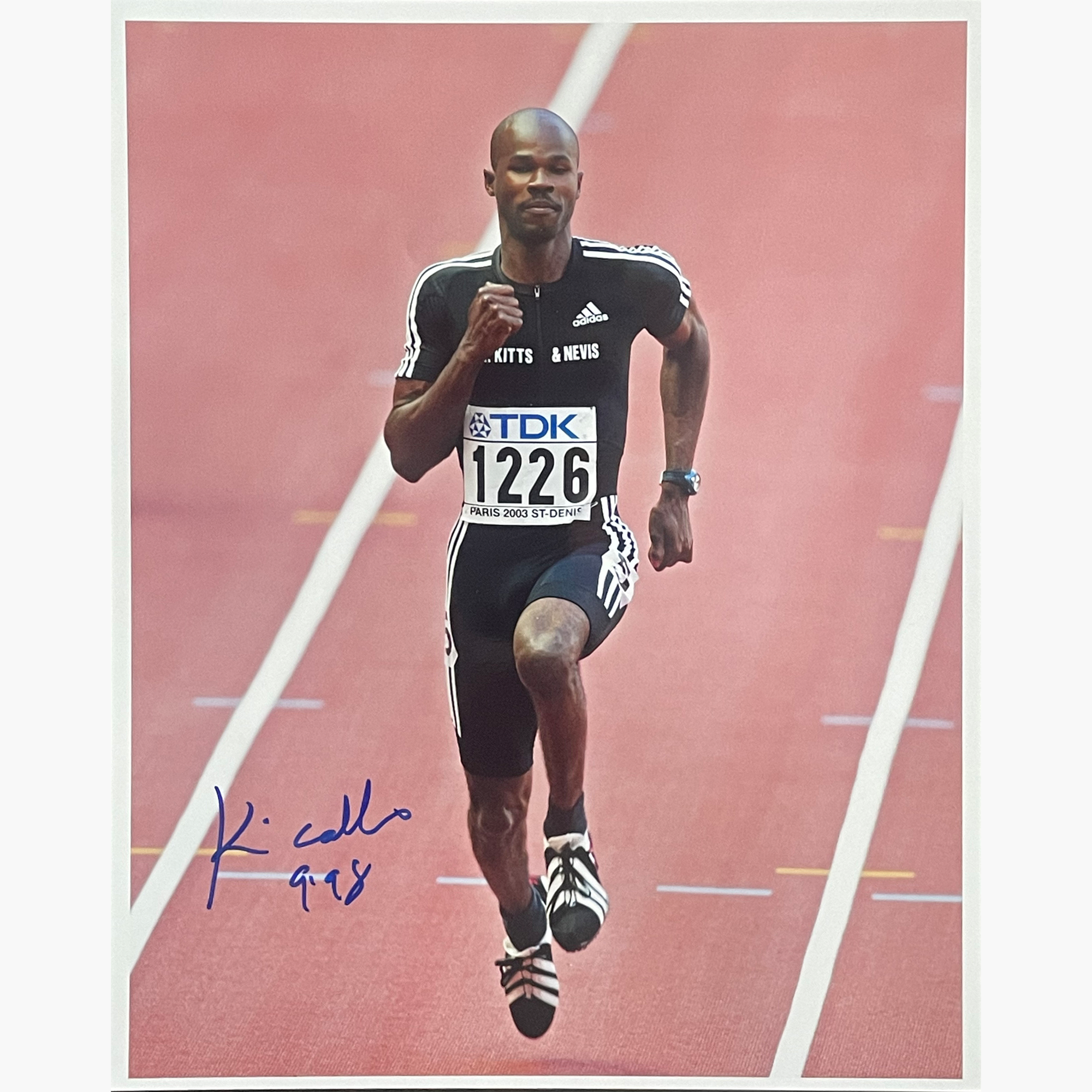 Kim Collins – Signed 25.3cm x 20.2cm Colour Action Photo