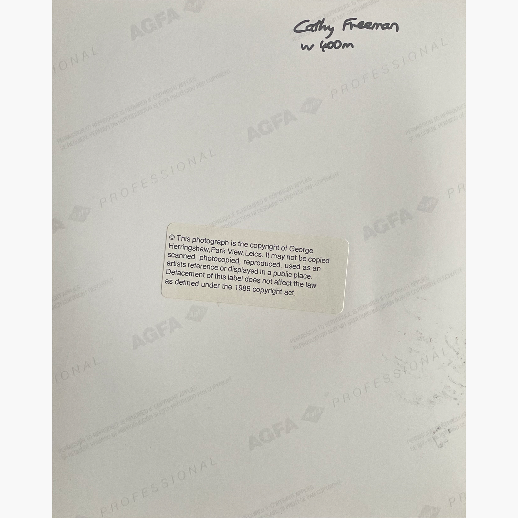 Cathy Freeman – Signed 25.5cm x 20.5cm Colour Action Press Photo