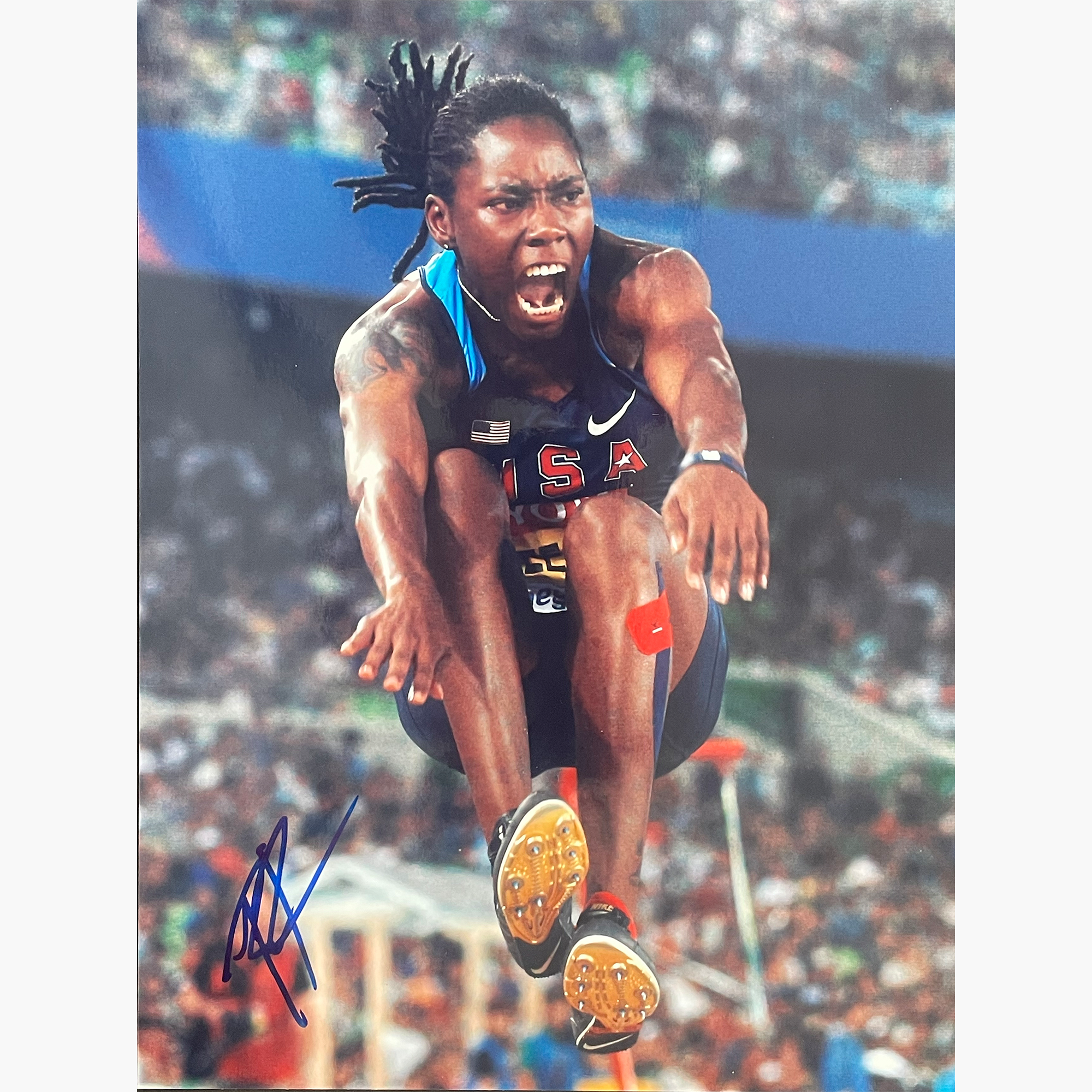 Brittney Reese – Signed 26.8cm x 20.2cm Colour Action Photo