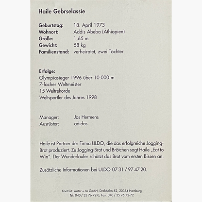 Haile Gebrselassie – Signed 14.8cm x 10.5cm Official “Brot und Brötchen” Sponsor Photo Card