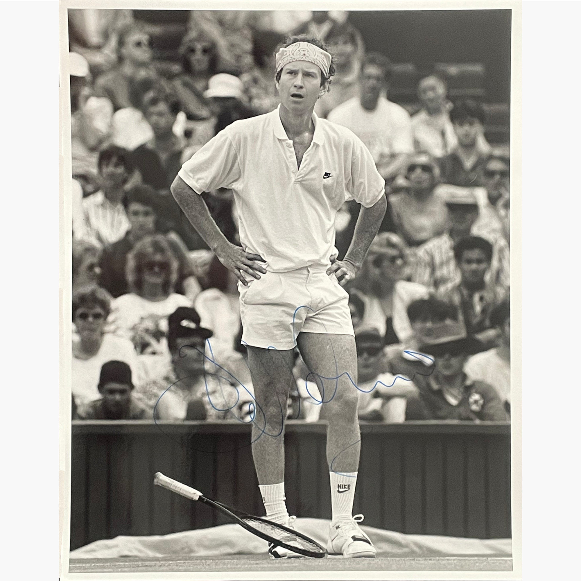 John McEnroe - Signed 25.5cm x 20.5cm Black & White Action Press Photo