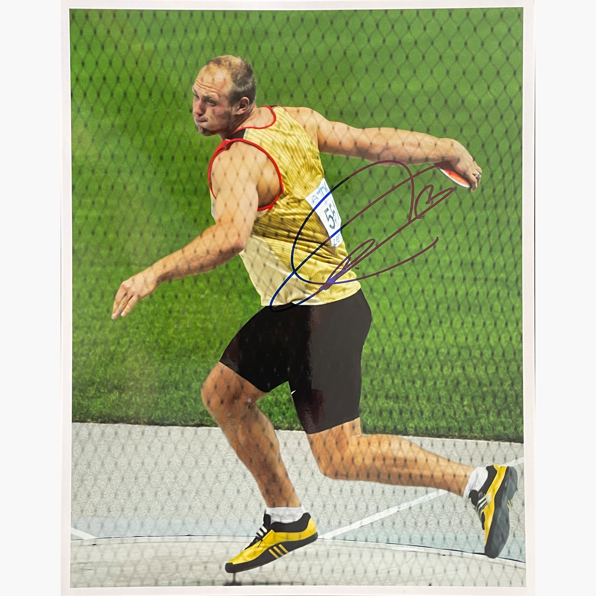 Robert Harting – Signed 25.3cm x 20.2cm Colour Action Photo