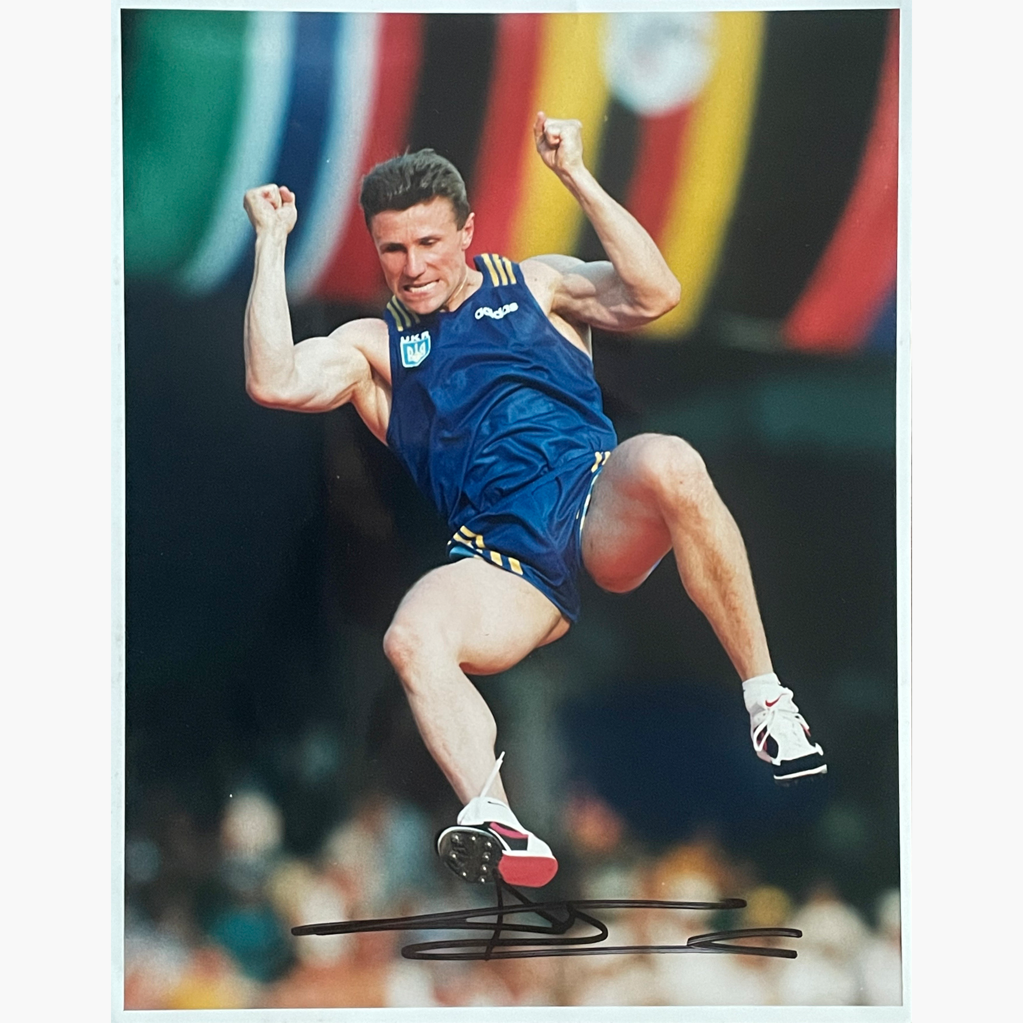 Sergey Bubka – Signed 25.3cm x 20.2cm Colour Action Press Photo