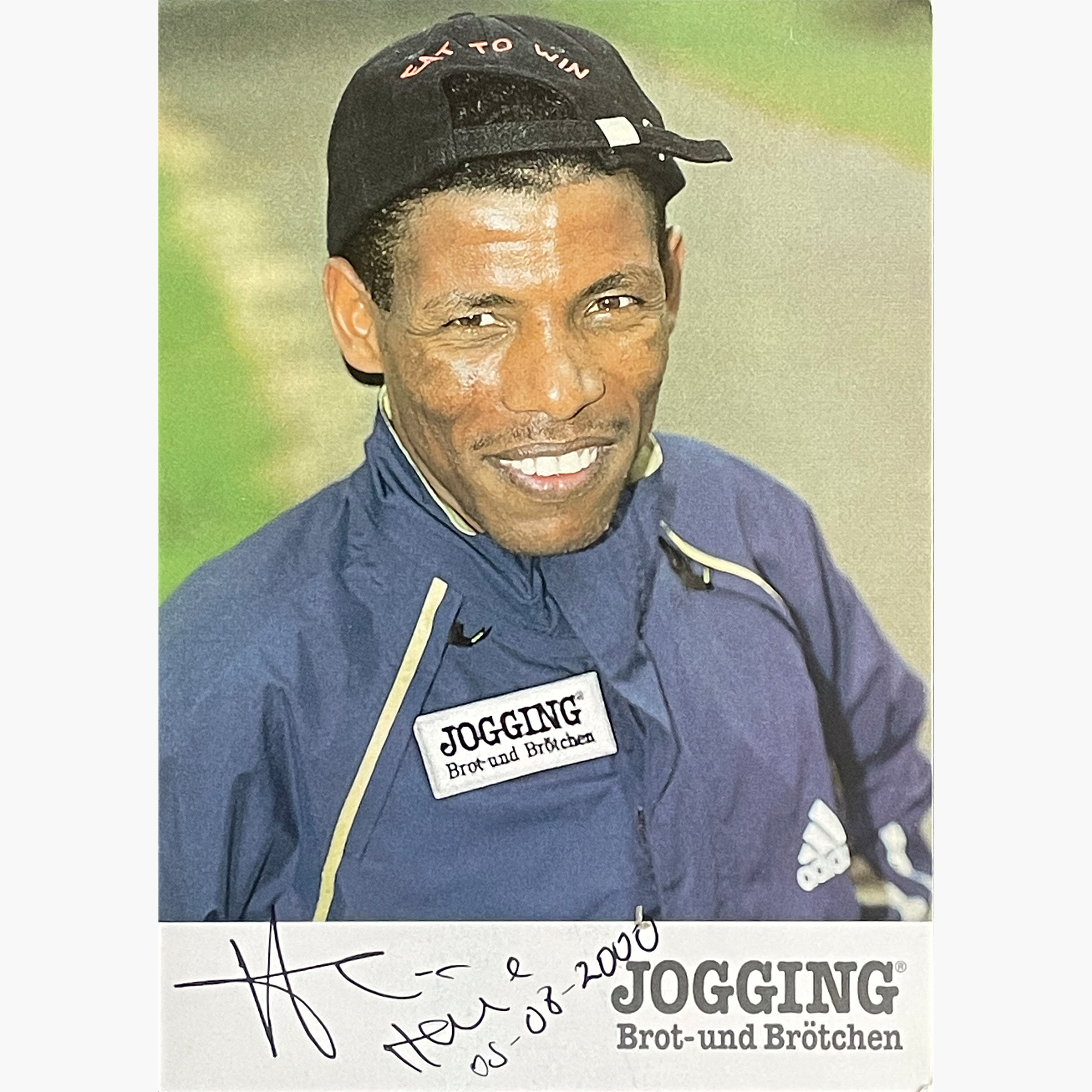 Haile Gebrselassie – Signed 14.8cm x 10.5cm Official “Brot und Brötchen” Sponsor Photo Card