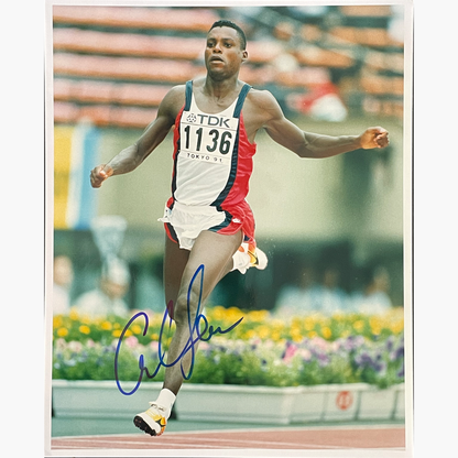 Carl Lewis – Signed 25.3cm x 20.2cm Colour Action Press Photo
