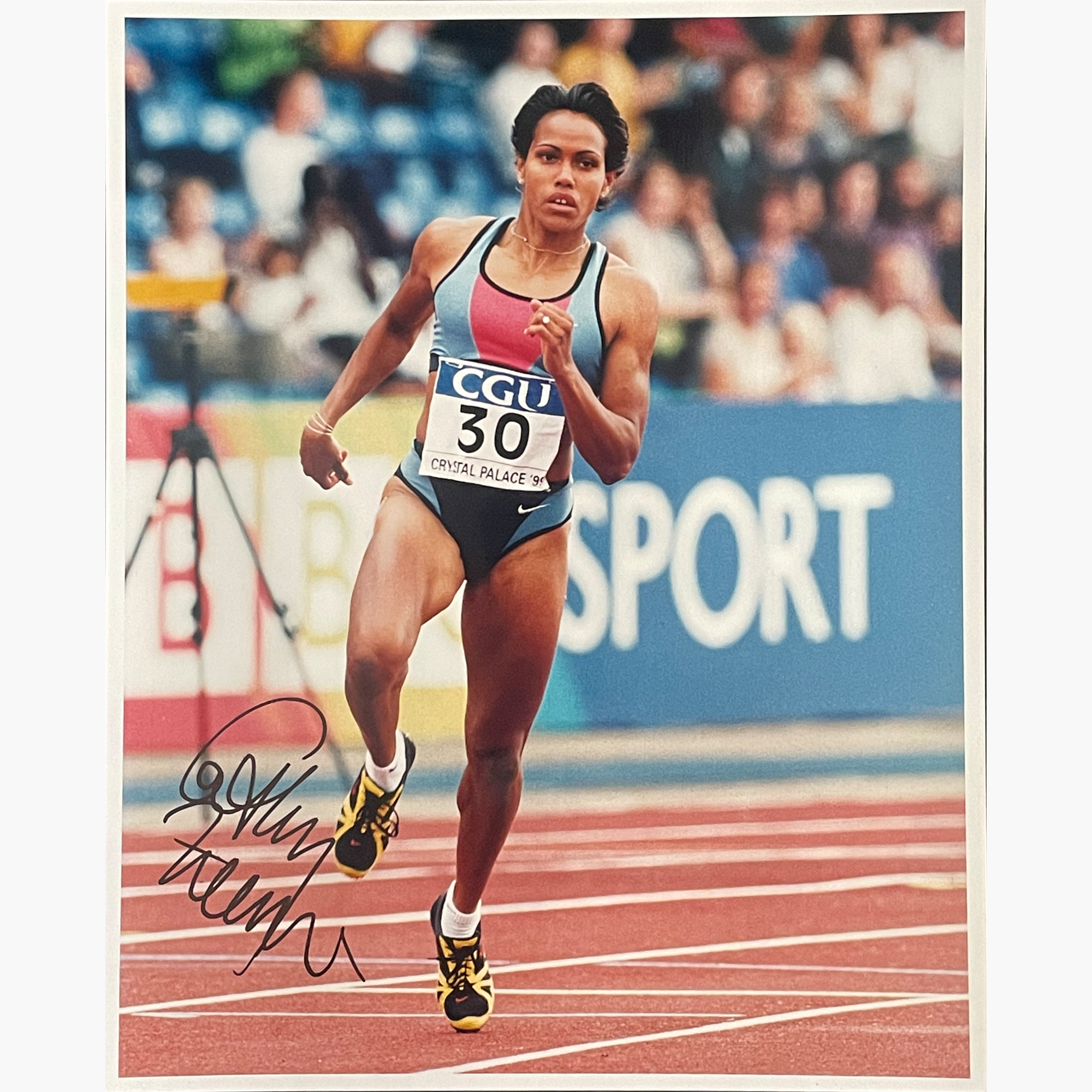 Cathy Freeman – Signed 25.5cm x 20.5cm Colour Action Press Photo