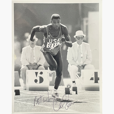 Carl Lewis – Signed 25.3cm x 20.2cm Black & White Action Press Photo