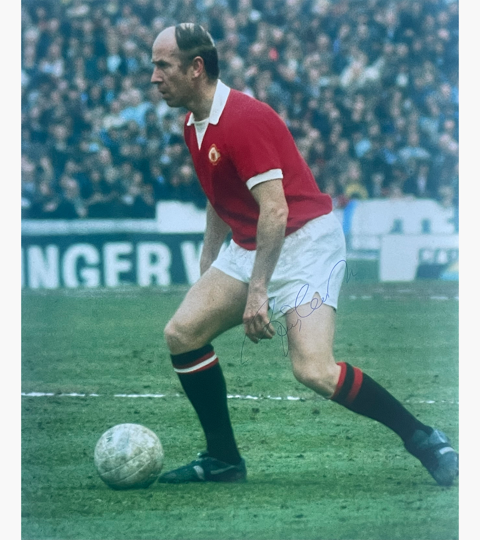 Bobby Charlton – Signed 25.4cm x 20.3cm Colour Action Photo