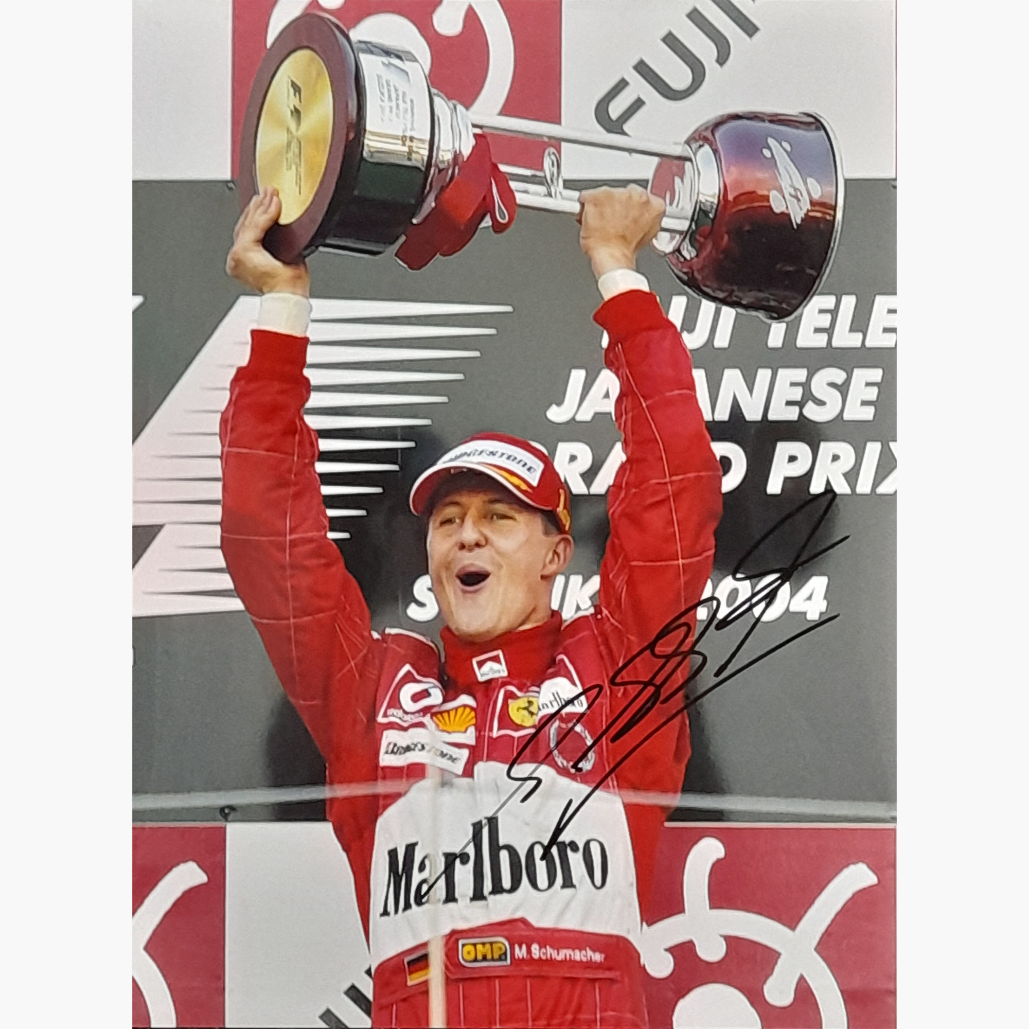 Michael Schumacher Signed Photo – Ferrari Podium Celebration (16" x 12")