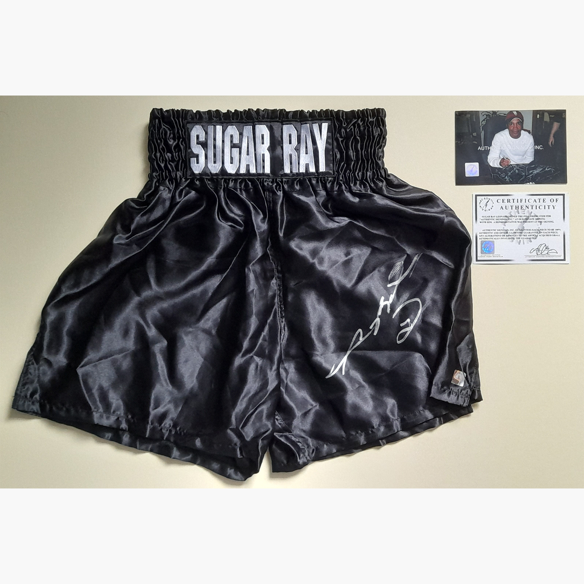 Sugar Ray Leonard Signed Boxing Trunks – Black Satin with Silver Autograph