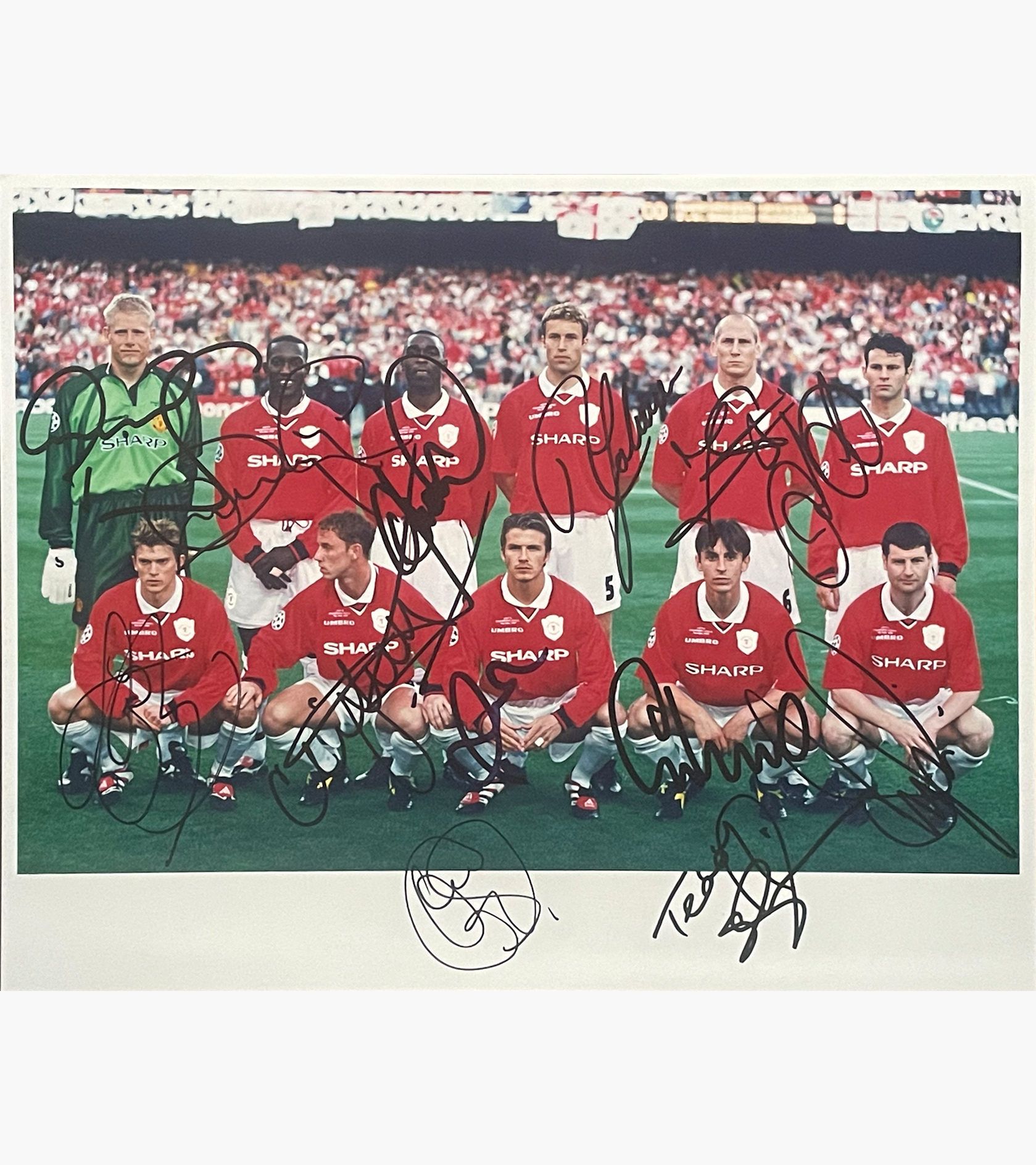 Schmeichel, Yorke, Cole, Johnsen, Stam, Giggs, Blomqvist, Butt, Beckham, Neville, Irwin, Solskjaer & Sheringham – Signed 25.5cm x 20.3cm Colour Photo